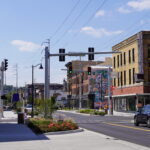 image featuring main street in New Albany, Indiana, street and street features present